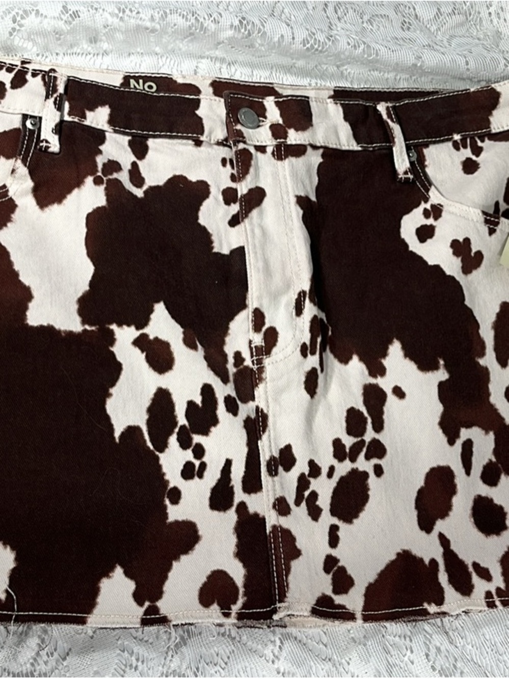 No Boundaries Women’s Brown and White Cow Print Shirt
